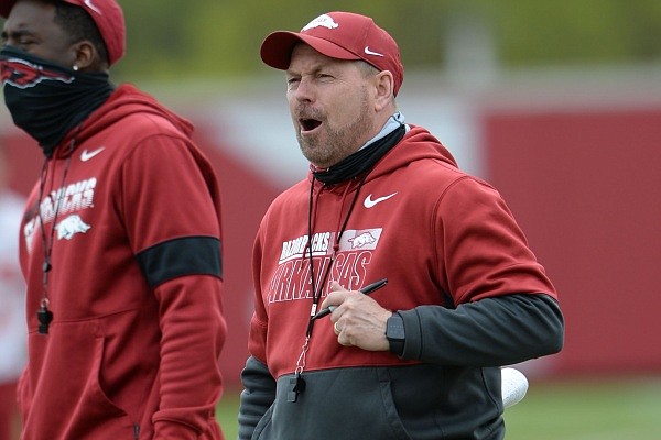 Arkansas special teams coordinator Scott Fountain watches Thursday, April 15. 2021, during practice at the university practice field in Fayetteville.