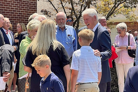 Former President Bill Clinton visits with mourners outside Gillett Methodist Church on Saturday before speaking at the funeral for Marion Berry, who represented Arkansas’ 1st Congressional District from January 1997 to January 2011. Berry died May 19 at age 80.
(Arkansas Democrat-Gazette/Tony Holt)