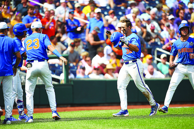 Florida sets College World Series record for runs with 24-4 win