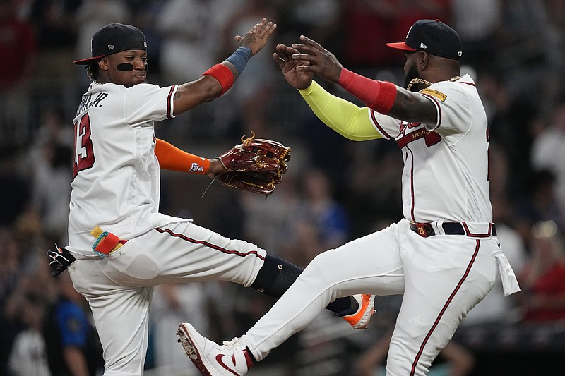 Ozuna, Acuña hit homers to back Strider's 10 strikeouts as Braves top Twins