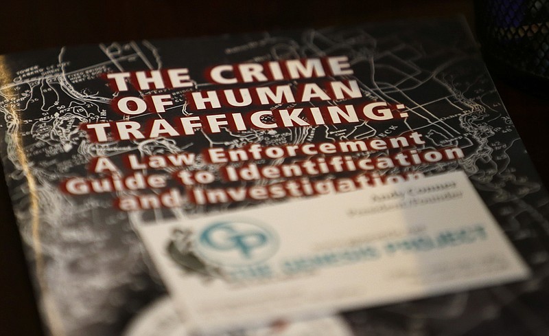 A law-enforcement guide to human trafficking sits on a table at The Genesis Project, a drop-in center for victims of sex trafficking in SeaTac, Wash., in this Feb. 27, 2017 file photo. (AP/Ted S. Warren)