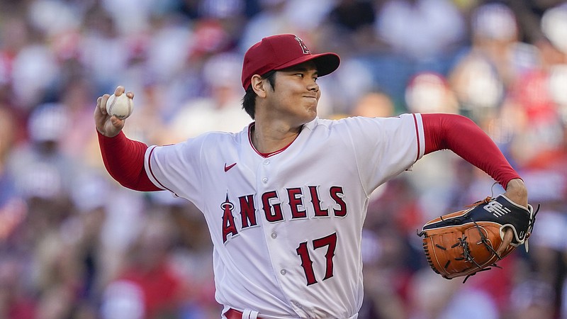 Los Angeles Angels starting pitcher Shohei Ohtani (17) pitches during the first inning of a baseball game against the Houston Astros, Friday, July 14, 2023, in Anaheim, Calif. (AP Photo/Ryan Sun)