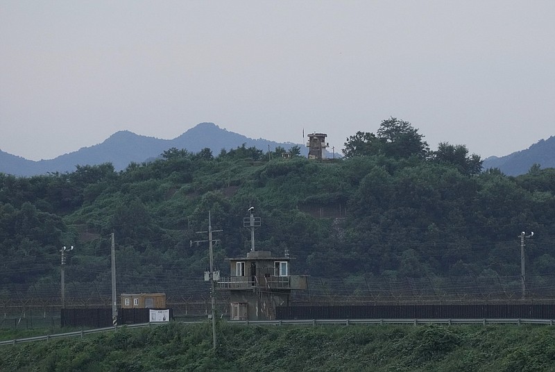 A North Korean military guard post, rear, and South Korea post, bottom, are seen in Paju near the border with North Korea, South Korea, Tuesday, July 18, 2023. (AP/Ahn Young-joon)