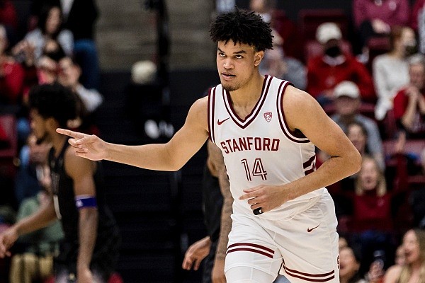 Stanford forward Spencer Jones gestures after scoring against Washington during the second half of an NCAA college basketball game in Stanford, Calif., Sunday, Feb. 26, 2023. Stanford won 81-69. (AP Photo/John Hefti)