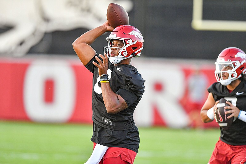 Arkansas junior transfer quarterback Jacolby Criswell throws a pass during the Razorbacks’ practice Friday in Fayetteville. Criswell is working with the second unit while senior Cade Fortin is with the third group.
(NWA Democrat-Gazette/Hank Layton)