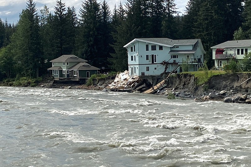 At least 2 buildings destroyed in flooding in Alaska's capital from