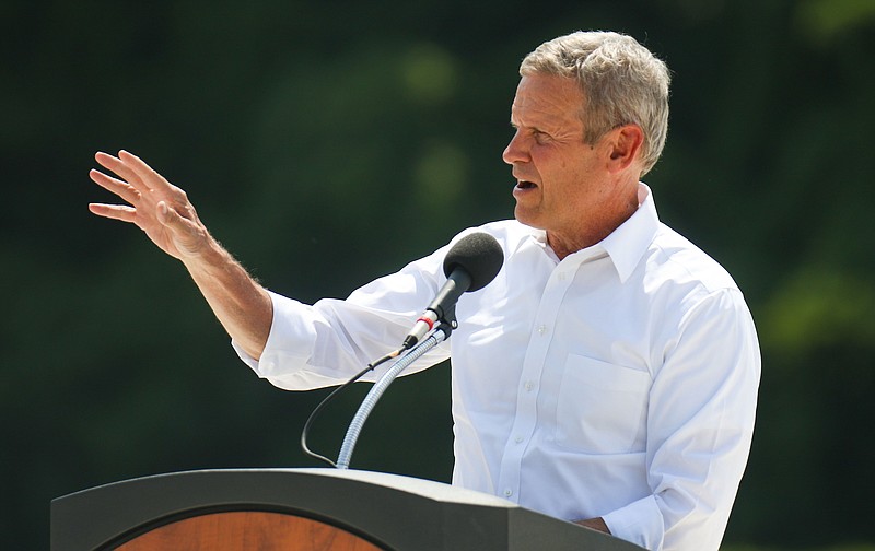 Staff photo by Olivia Ross / Gov. Bill Lee speaks to the audience. Governor Bill Lee signed the Transportation Modernization Act at the site of the Apison Pike reconstruction as part of the governor’s “Build with us Tour” on Tuesday, July 18, 2023.
