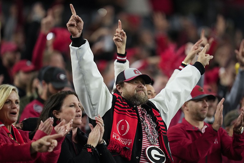 FILE - Georgia fans cheer during the second half of the national championship NCAA College Football Playoff game between Georgia and TCU, Monday, Jan. 9, 2023, in Inglewood, Calif. Georgia's won two straight national championships, but hasn't been preseason No. 1 since 2008. (AP Photo/Ashley Landis, File)
