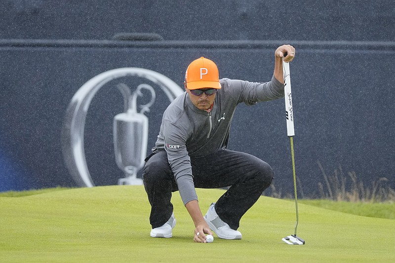 United States' Rickie Fowler lines up his putt not he 1st green during the final day of the British Open Golf Championships at the Royal Liverpool Golf Club in Hoylake, England, Sunday, July 23, 2023. (AP Photo/Jon Super)