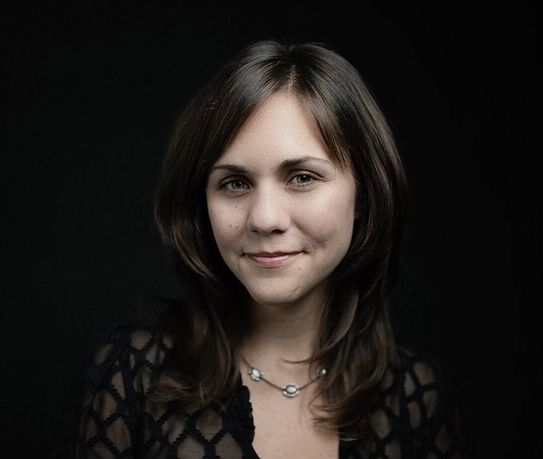 Review: Amanda Held Opelt reconciles faith and grief in 'A Hole in the World' - Vimarsana News