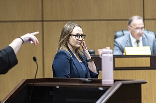 Jeff Rinderle A Georgia teacher wants to overturn her firing for reading a book to ...