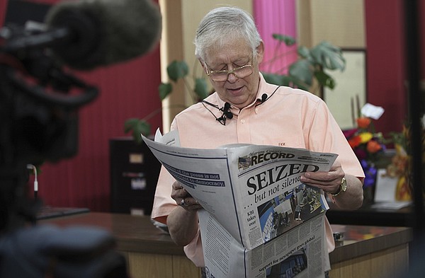 Newspaper publishes first edition since raid