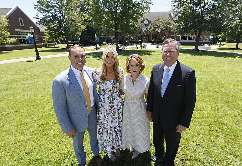 Jamie Griffin (from left), head of school at Episcopal Collegiate School in Little Rock; Joan Strauss, president of the school’s board of trustees; and Harriet and Warren Stephens pose for a photograph outside the school on Thursday. The Harriet and Warren Stephens Family Foundation gave $25 million to the school to mark the school’s 25th anniversary. More photos at arkansasonline.com/818episcopal/.
(Arkansas Democrat-Gazette/Thomas Metthe)
