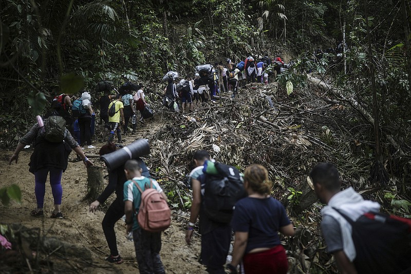 Migrants walk across the Darien Gap from Colombia to Panama in hopes of reaching the United States in this May 9, 2023 file photo. (AP/Ivan Valencia)