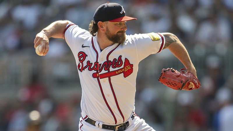 Atlanta Braves relief pitcher Kirby Yates throws to a San Francisco Giants batter during the ninth inning of a baseball game Sunday, Aug. 20, 2023, in Atlanta. (AP Photo/Hakim Wright Sr.)