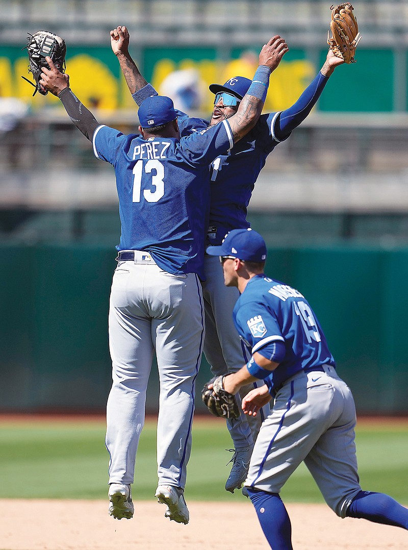 Maikel Garcia of the Kansas City Royals celebrates with Salvador