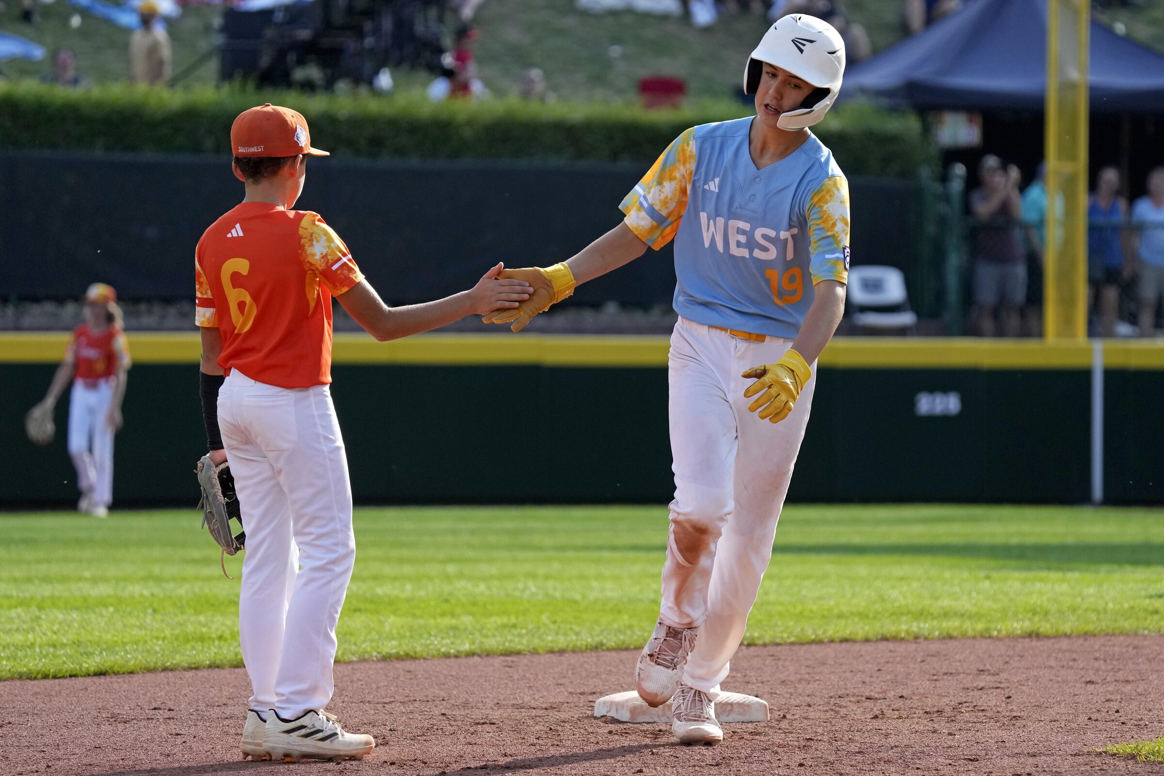 Youth baseball teams advance to national regional round