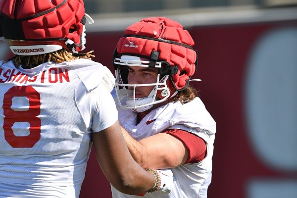 Why Alabama football players are wearing padded helmets in practice 