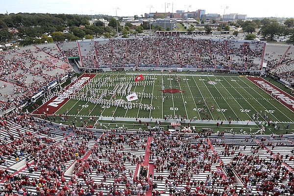 Arkansas players take the field prior to a game against Arkansas-Pine Bluff on Saturday, Oct. 23, 2021, at War Memorial Stadium in Little Rock.