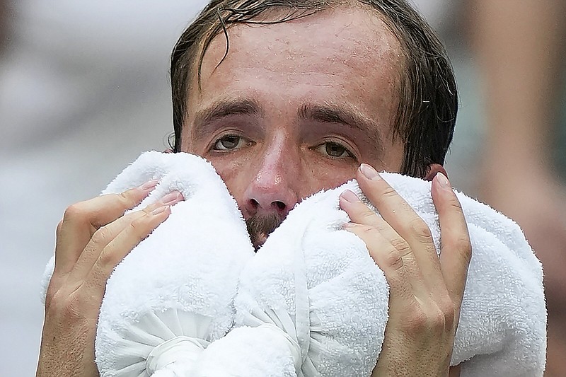 Daniil Medvedev, the No. 3 seed from Russia, cools off between games against Andrey Rublev, also of Russia, during the quarterfinals of the U.S. Open on Wednesday in New York.
(AP/Seth Wenig)