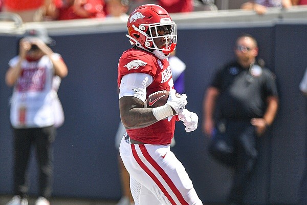 Arkansas running back Raheim Sanders scores a rushing touchdown, Saturday, Sept, 2, 2023, during the first quarter of the Razorbacks' 56-13 win over Western Carolina at War Memorial Stadium in Little Rock. Visit nwaonline.com/photo for the photo gallery.