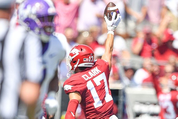 Arkansas defensive back Hudson Clark (17) reacts after catching an interception, Saturday, Sept, 2, 2023, during the first quarter against Western Carolina at War Memorial Stadium in Little Rock. Visit nwaonline.com/photo for the photo gallery.