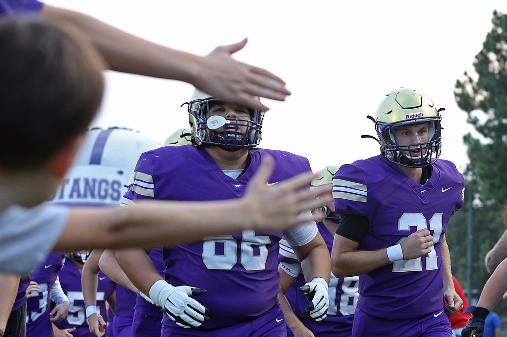 PREP FOOTBALL Pair of UA commits square off as CAC ekes by Bauxite