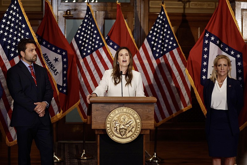 Arkansas Gov. Sarah Huckabee Sanders joined by Sen. Jonathan Dismang, R-Beebe, left, and Lt. Gov. Leslie Rutledge called a special legislative session focusing on tax rates and the state's Freedom of Information Act during a news conference on Friday, Sept. 8, 2023. (Arkansas Democrat-Gazette/Thomas Metthe)