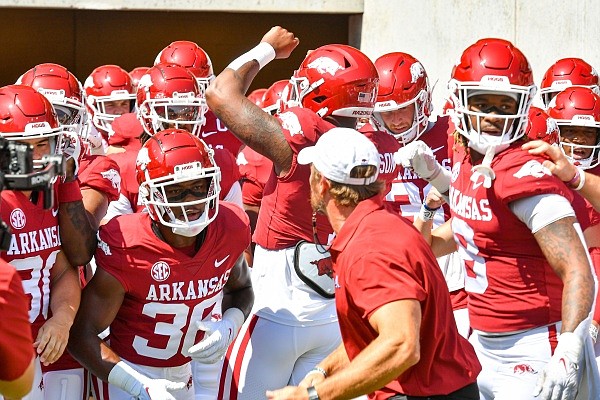 Arkansas players take the field during warmups, Saturday, Sept, 9, 2023, before the Razorbacks’ game against Kent State at Donald W. Reynolds Razorback Stadium in Fayetteville. Visit nwaonline.com/photo for the photo gallery.