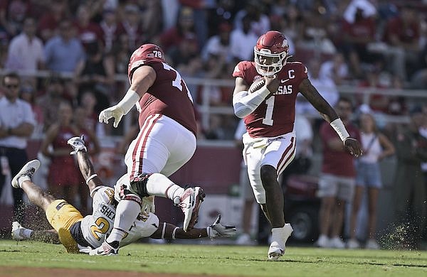 Arkansas quarterback KJ Jefferson (1) carries the ball during a game against Kent State on Saturday, Sept. 9, 2023, in Fayetteville.