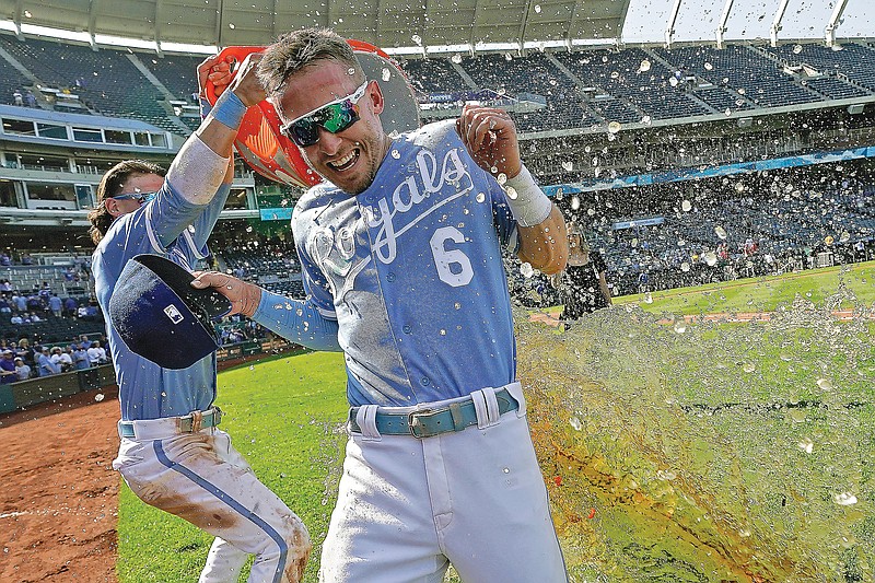 Drew Waters is doused by Royals teammate Bobby Witt Jr. after Monday afternoon’s 6-4 win against the Guardians at Kauffman Stadium in Kansas City. (Associated Press)