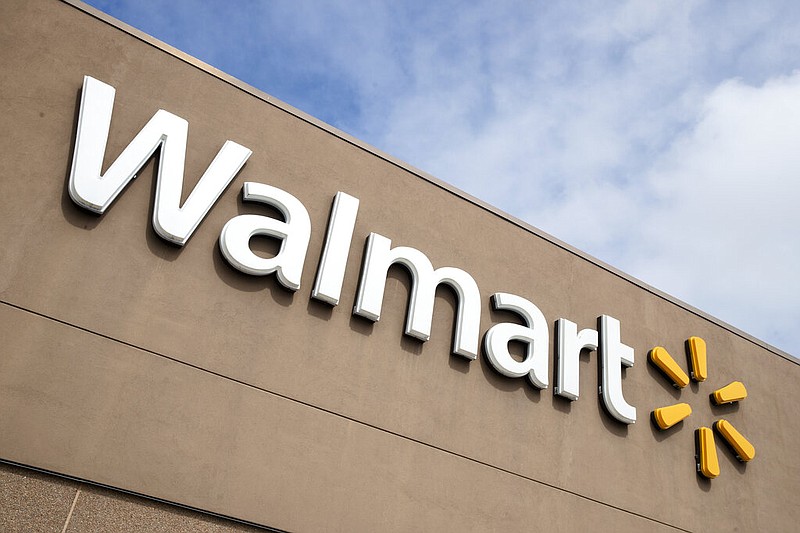 The logo outside of a Walmart is shown in this March 17, 2020 file photo. (AP/Matt Rourke)