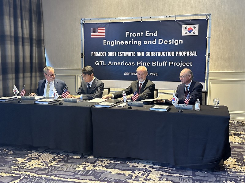 Left to right: S&B CEO Brook Brookshire, Hyundai Engineering CEO H.S. Han, GTLA Chairman Roger Williams and GTLA President Leon Codron sign a contract associated with Hyundai and S&B’s work on GTLA’s planned natural gas-to-liquid fuel production facility in Jefferson County on Wednesday at the Little Rock Marriott, 3 Statehouse Plaza