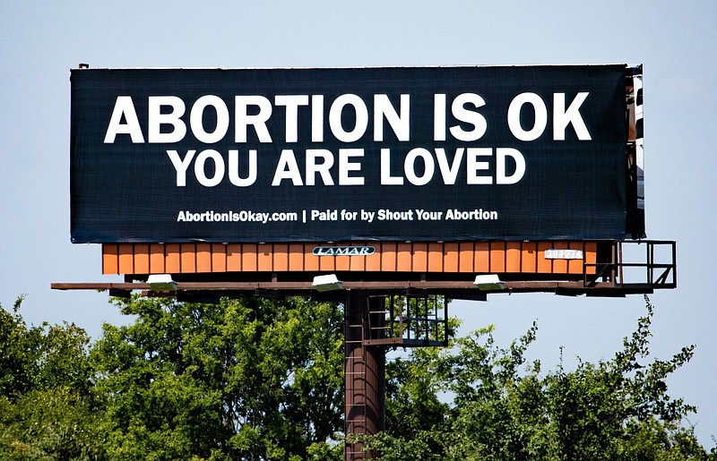 The activist group Shout Your Abortion recently posted six billboards along Interstate 55, which runs through five states that have banned most abortions. (Kristen Archer/ARCHd/Washington Post)