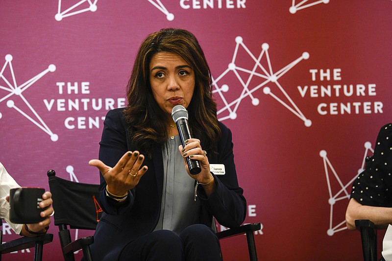 Esperanza Massana Crane, director of Small Business and Entrepreneurship Development for the Arkansas Economic Development Commission, sits on a panel discussion on resources for small business owners at the Venture Center earlier this month.
(Arkansas Democrat-Gazette/Stephen Swofford)
