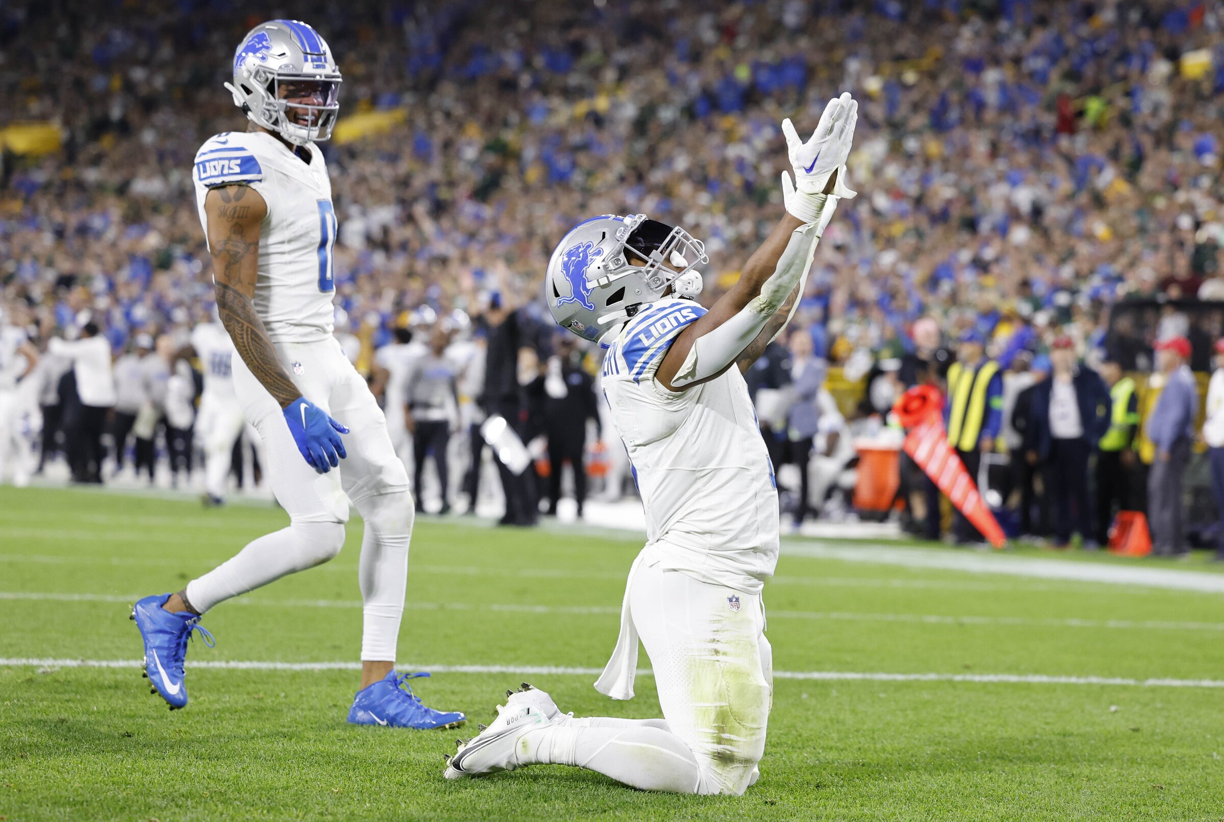 Detroit Lions safety Brian Branch (32) intercepts a pass intended