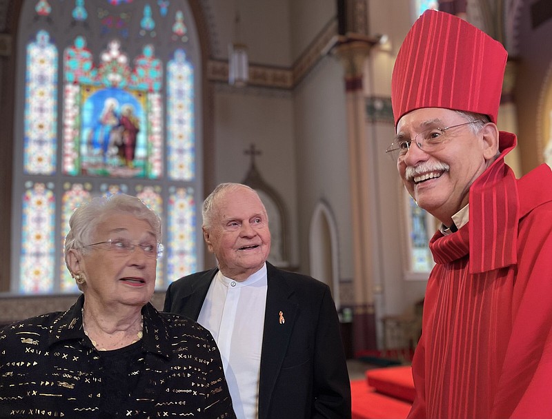 Pauline and Deacon Larry Jegley, parents of former Pulaski County prosecuting attorney Larry Jegley, visit with Bishop Anthony Taylor following last year’s Red Mass at the Cathedral of St. Andrew in Little Rock. This year’s Mass will be held Friday at Little Rock’s Christ the King Church.
(Arkansas Democrat-Gazette/Frank E. Lockwood)