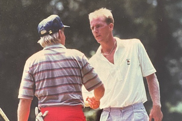 Petey King, right, shakes hands with John Daly following the quarterfinals of the Arkansas state match play at Texarkana Country Club in 1987. King never lost a hole in this match and claimed a 2-and-1 victory over his University of Arkansas teammate and future PGA Championship champion (1991) and British Open champion (1995).