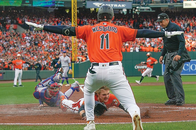 Henderson and Rodriguez help Orioles go a game up on Rays in AL