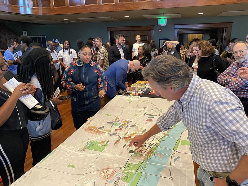 A map of downtown Little Rock sits on display during an open house on Wednesday, Oct. 11, 2023 at the Mosaic Templars Cultural Center to kick off an effort to create a downtown master plan. 
(Arkansas Democrat-Gazette/Joseph Flaherty)