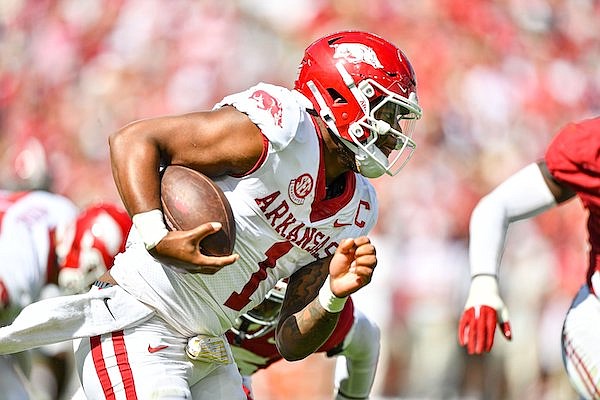 Arkansas quarterback KJ Jefferson carries the ball during a game against Alabama on Saturday, Oct. 14, 2023, in Tuscaloosa, Ala.