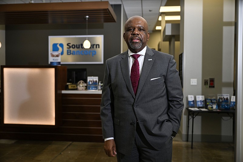 Darrin Williams, CEO of Southern Bancorp, poses for photos outside a new bank branch on 12th street in Little Rock on Wednesday, Sept. 27, 2023..(Arkansas Democrat-Gazette/Stephen Swofford)