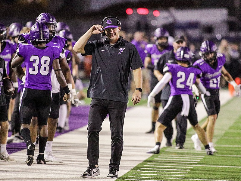 Fayetteville Bulldogs head coach Casey Dick smiles after a touchdown during the Rogers at Fayetteville football game at Harmon Field , September 29, 2023, Fayetteville, Arkansas (Special to NWA Democrat-Gazette/Brent Soule)