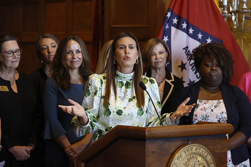 Gov. Sarah Huckabee Sanders announces an executive order “to eliminate woke, anti-women words from state government and respect women” during a news conference at the state Capitol in Little Rock on Thursday.
(Arkansas Democrat-Gazette/Thomas Metthe)