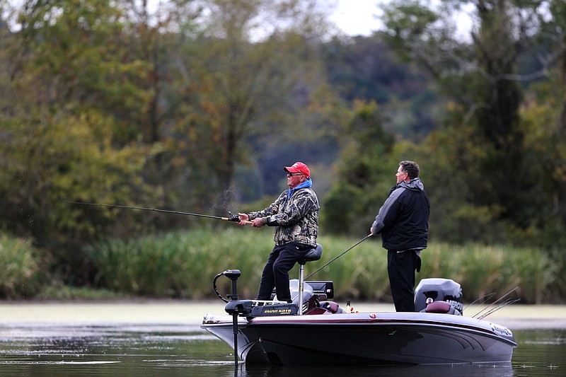 Staff Photo / Mike McAtee of Henderson, Ky., and Jody Moore, of Hixson, fish from their boat during the Fishing League Worldwide Bass Fishing League Regional Championship tournament in October 2018. The first-ever Bill Dance Giant Bass Open, launching from Blue Water Marina in Dayton, is set for Saturday and Sunday.