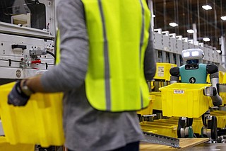 Amazon unveils new human-shaped warehouse robot, more powerful drone ...