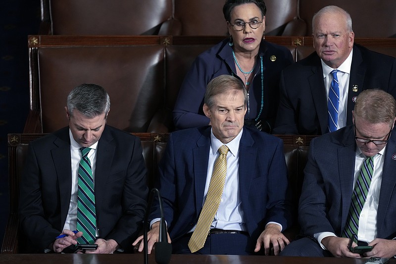 Rep. Jim Jordan, R-Ohio, center, and others, look on as the vote is counted for a third ballot to elect a speaker of the House, at the Capitol in Washington, Friday, Oct. 20, 2023. (AP Photo/J. Scott Applewhite)