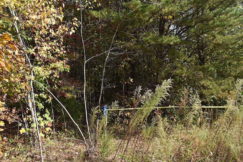 McMinn County Sheriff’s Office / Crime scene tape is seen at the location where hunters found skeletal remains Thursday off state Highway 30 west of Athens.