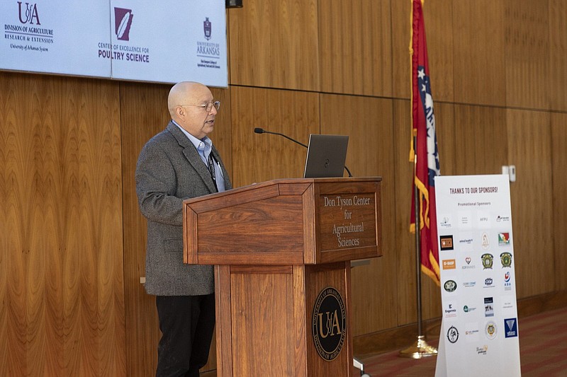 University of Arkansas System Division of Agriculture poultry researcher Guillermo Tellez-Isaias addresses the audience at the opening of the International Avian Influenza Summit held Oct. 16-17 at Fayetteville. Tellez-Isaias was organizer of the event. (Special to The Commercial/Nick Kordsmeier/University of Arkansas System Division of Agriculture)