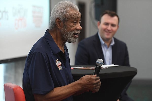 Former Arkansas men’s basketball coach Nolan Richardson speaks Wednesday, Oct. 25, 2023, while being interviewed by Matt Jones during the Hawgs Illustrated Sports Club luncheon at Home 2 Suites in Springdale.